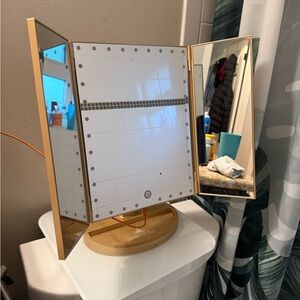 Elegant Gold Tri-Fold Vanity Mirror